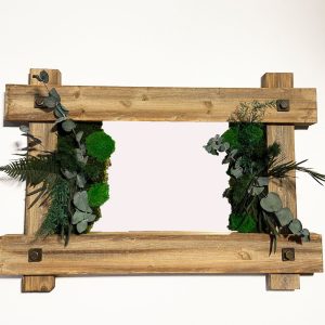 Vintage mirror art with plants and moss