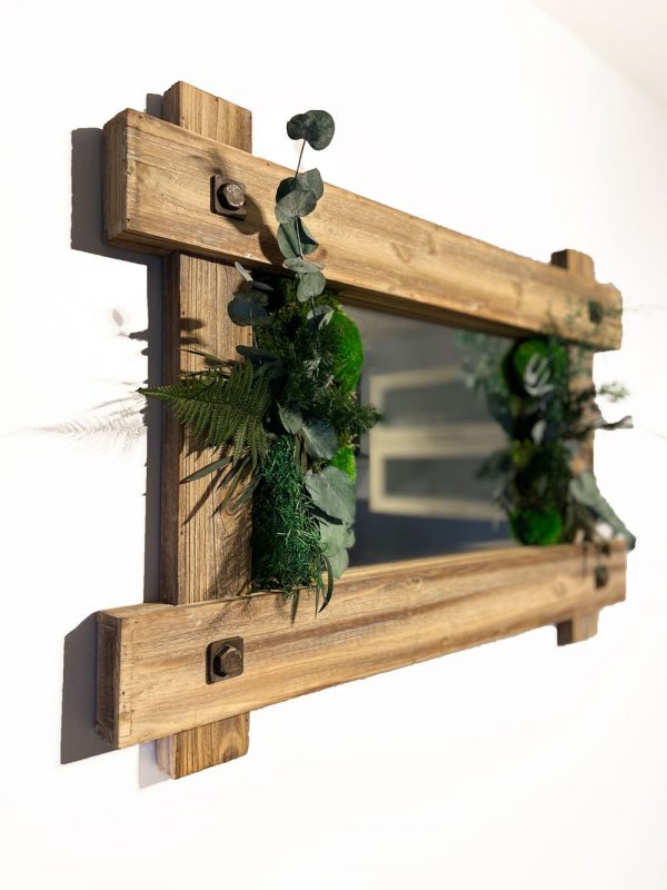 Vintage moss mirror with plants